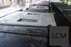 Casting beds carrying moulded panels with cast-in recesses